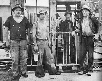 Central Deborah Gold Mine Miners standing at Cage